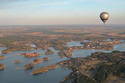 The stunning aerial view of Lake Galvė’s serene waters in Trakai, Lithuania in the day.