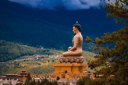 Buddha Dordenma in Bhutan with brass architecture, green mountains, one of the best places to visit in Bhutan in February.