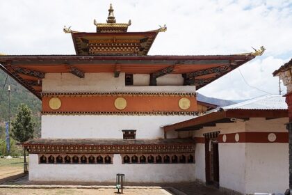 Chimi Lhakhang amid lush greenery, one of the best places to visit in Bhutan in July.