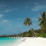 White beach and blue sea on Mantanani Island, one of the best places to visit near Kota Kinabalu.