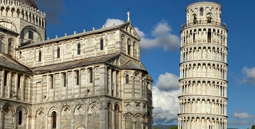Leaning Tower of Pisa under blue sky, one of the best places to visit near Florence.