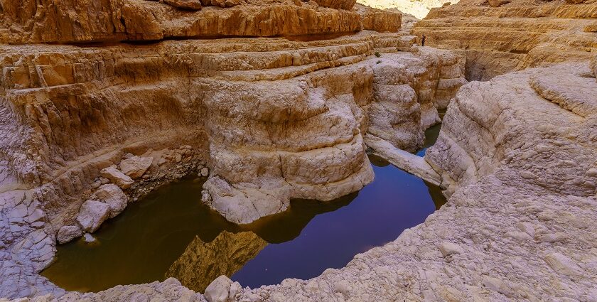 The ancient ruins of the Masada fortress on rocky cliffs, one of the historic places to visit near Jerusalem.
