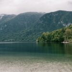 Lake Bohinj’s serene waters and alpine backdrop make it one of the top places to visit near Ljubljana.