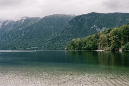 Lake Bohinj’s serene waters and alpine backdrop make it one of the top places to visit near Ljubljana.