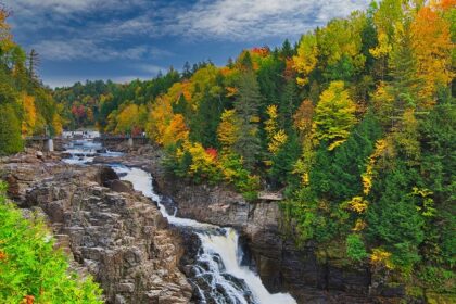Canyon Sainte-Anne in autumn foliage, a top places to visit near Quebec City.