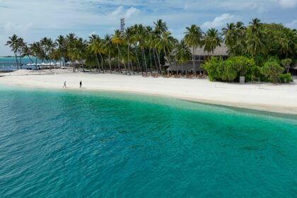 Turquoise beach in the Maldives, a tropical gem among places to visit near Seychelles.