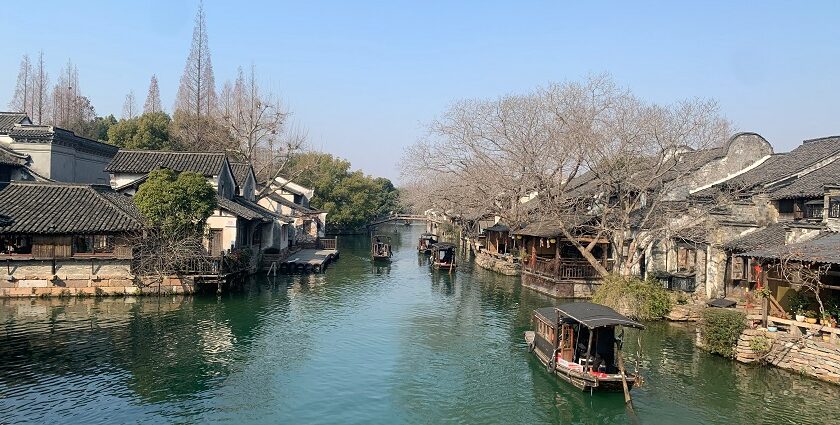 Traditional canal houses and boats in Wuzhen, one of the best places to visit near Shanghai.