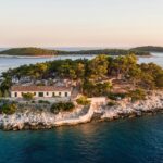 Aerial view of Hvar Island surrounded by clear blue water, one of the best places to visit near Split.