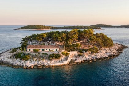 Aerial view of Hvar Island surrounded by clear blue water, one of the best places to visit near Split.