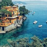 Breathtaking sea shore cliffs and blue water at Portofino, top places to visit near Switzerland.
