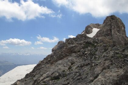 Chimgan Mountain scenic view with green hills, among peaceful places to visit near Tashkent.