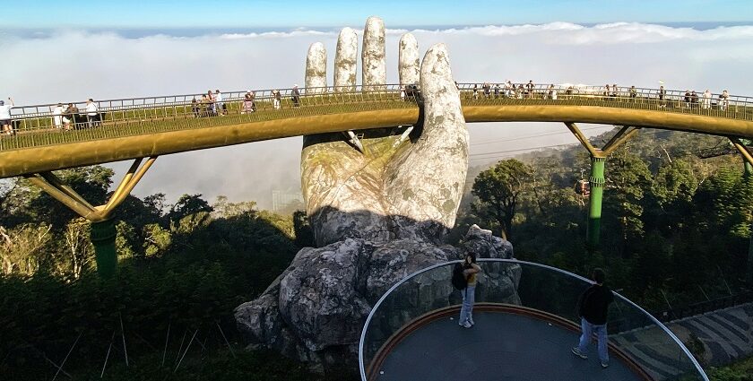 The Majestic Golden Bridge in Vietnam showcases breathtaking views and places to visit near Thailand.