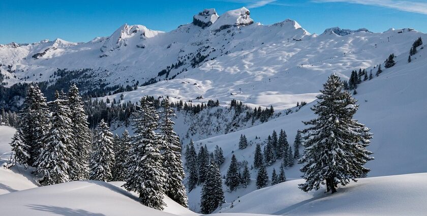 Scenic view of Grächen with snow-covered mountains, charming places to visit near Zermatt.