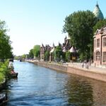 Haarlem canal with city lights and reflections, top things to do in Haarlem at night.