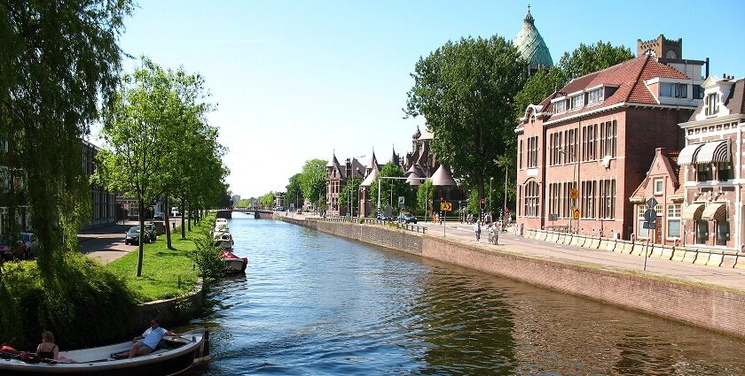 Haarlem canal with city lights and reflections, top things to do in Haarlem at night.
