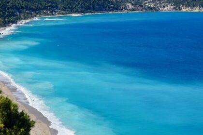 Relax on stunning Gidaki Beach, one of the serene things to do in Ithaca Greece.