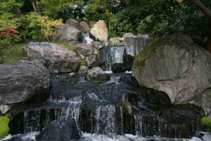 Admiring the serene waterfall is one of the most peaceful things to do in Kensington.