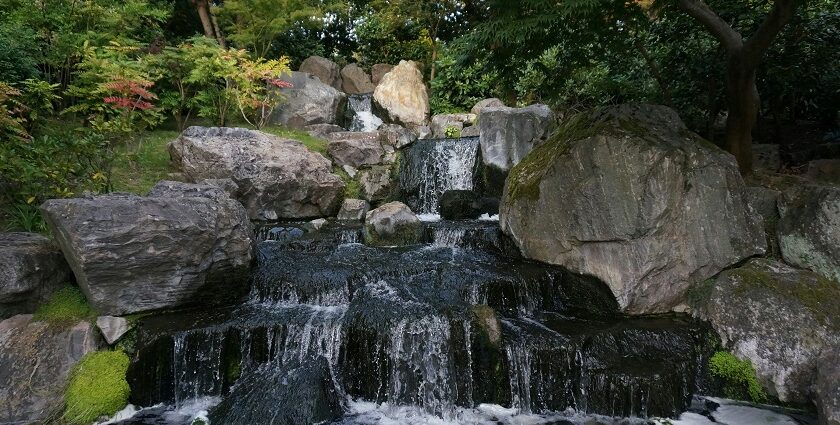 Admiring the serene waterfall is one of the most peaceful things to do in Kensington.