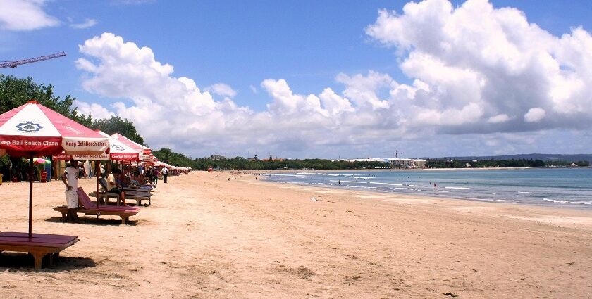 Exploring the serene shore is one of the most romantic things to do in Kuta for couples.