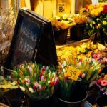 Browsing vibrant blooms at Columbia Road flower market is one of the best things to do in London UK in October.