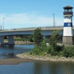 Plymouth Avenue Bridge over a water body in Plymouth with a small white architectural tower