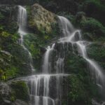 Bhatta Falls with rocky terrain and greenery is among the places to visit in Mussoorie near Kempty Falls.