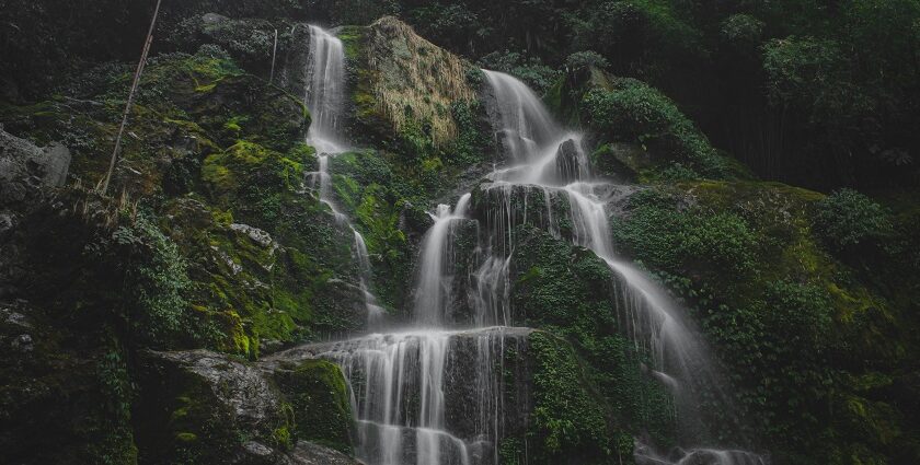 Bhatta Falls with rocky terrain and greenery is among the places to visit in Mussoorie near Kempty Falls.