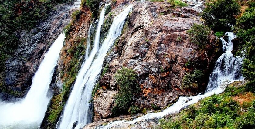 Shivanasamudra Falls, flowing over a rocky cliff, among the top places to visit near Adichunchanagiri.