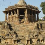 Modhera Sun Temple’s carved walls and steps, one of the places to visit near Ahmedabad for 1 day.