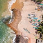 Serene Versova Beach shoreline with waves and soft sand is among top places to visit near Andheri West.