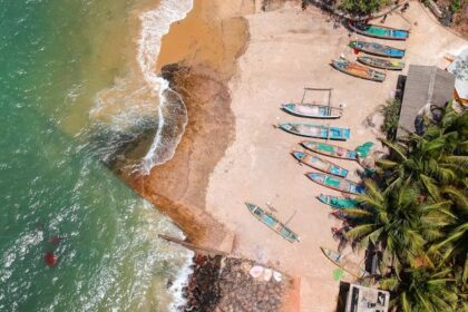 Serene Versova Beach shoreline with waves and soft sand is among top places to visit near Andheri West.