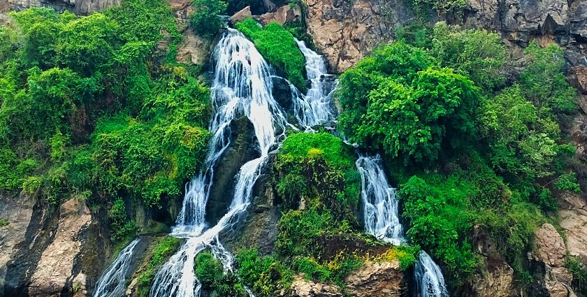 Chunchi Falls surrounded by rocks and greenery, one of the best places to visit near Bangalore for 1 day.
