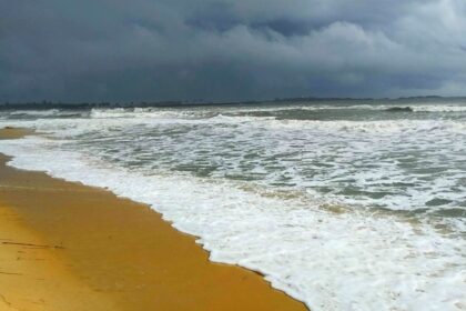 Golden sands and calm Arabian Sea at Malpe Beach, one of the top places to visit near Byndoor.