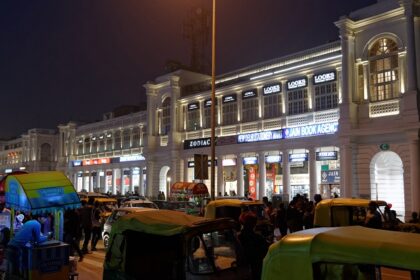 Night view of Connaught Place, New Delhi, highlighting bright Georgian architecture.