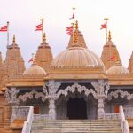 ISKCON Temple exterior with domes and pillars, one of the top places to visit near Grand Venice Mall
