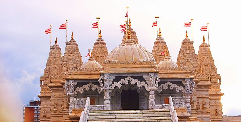 ISKCON Temple exterior with domes and pillars, one of the top places to visit near Grand Venice Mall