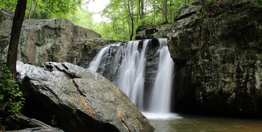 Barkana Falls view through lush forest among places to visit near Kavaledurga.