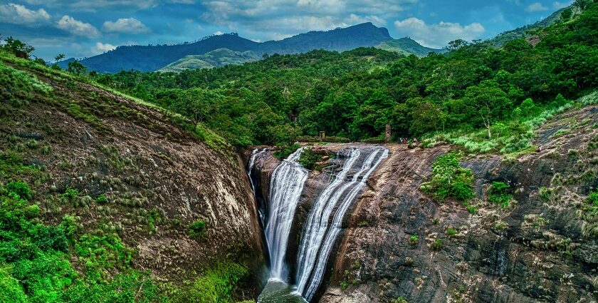 Vaideki Falls in a lush forest, a hidden gem among places to visit near Kodiveri.
