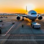 Airplane at runway during sunset at Mangaluru International Airport, one of the best airports in Karnataka.