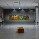 Interior view with traditional paintings adorning the walls, one of the best art galleries in Kerala.