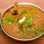 Delicious chicken curry served at one of the best non-veg restaurants in Guwahati.