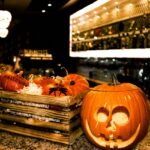 Halloween is celebrated with scary setups including that of carved pumpkins and spooky ambience.