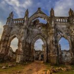Ruined Shettihalli Rosary Church at dusk, one of the haunted places in Karnataka.