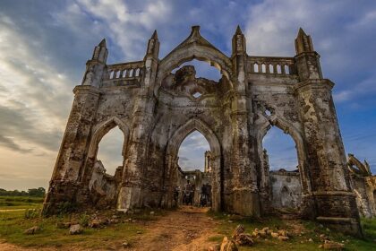 Ruined Shettihalli Rosary Church at dusk, one of the haunted places in Karnataka.