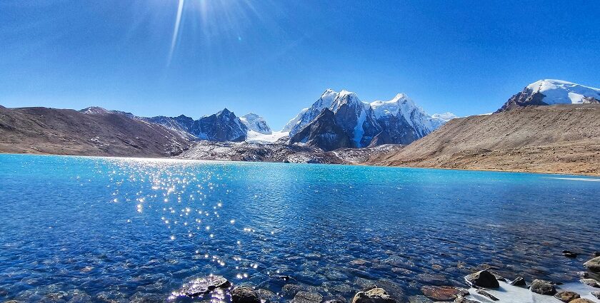 Gurudongmar Lake, with snowy peaks and clear blue water, one of the best hill stations in Sikkim.