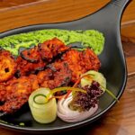 Tandoori chicken served hot with spices, one of the best Indian restaurants in Cappadocia Turkey.