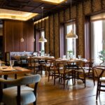 Interior of Dubb with tables and lights, one of the best indian restaurants in turkey.