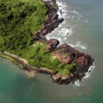 Aerial view of Kurumgad Island with lush greenery and coastline, one of the best islands in Karnataka.