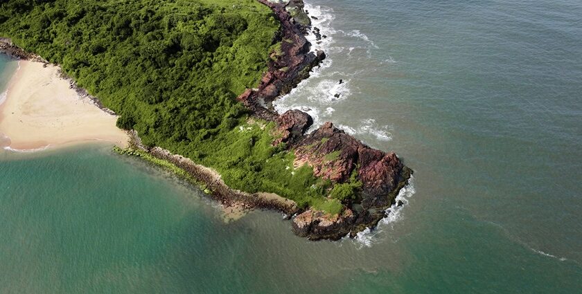 Aerial view of Kurumgad Island with lush greenery and coastline, one of the best islands in Karnataka.