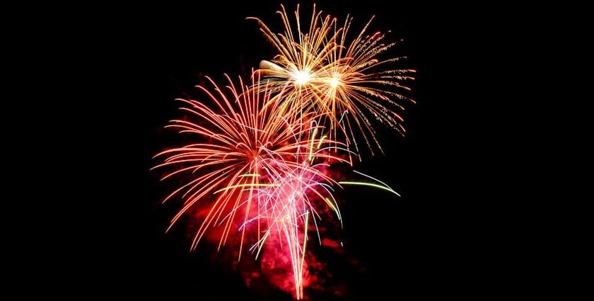 Colorful fireworks lighting up the night sky during vibrant celebrations of new year in Cambodia.